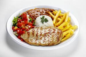 Rice, beans grilled chicken steak salad photo