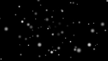 Snowfall with Bokeh Effect on Black Background for Winter Scene video
