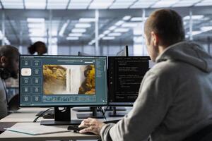 Technician in server hub making AI software turning text prompt into photos. Data center employee building text to image artificial intelligence generator transforming words into pictures photo