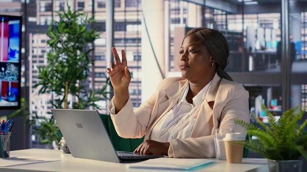 General manager working with a hologram illustration in office, studying infographics with hi tech interface. CEO uses artificial intelligence for holographic effects, business growth. Camera A. photo