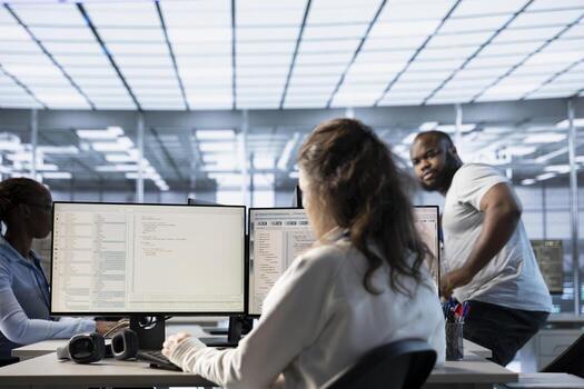 Computer scientist in data center office uses artificial intelligence neural networks doing computing processes. IT specialist working on PC with AI machine learning algorithms photo