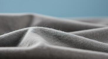 A close up of a gray fabric photo