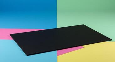 A black square on a colorful background photo