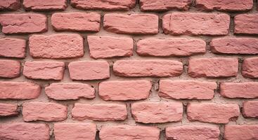 A close up of a brick wall with pink bricks photo