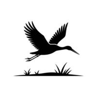 Black silhouette of a bird flying over grass vector