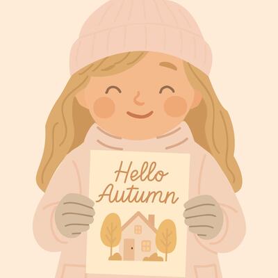 A girl holding a hello autumn card