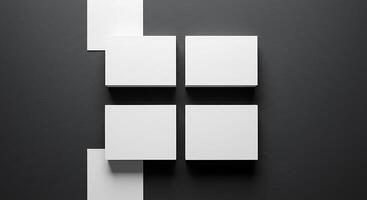Four white boxes on a black background photo