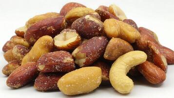 Salty Mixed Nuts Pile Close Up Healthy Snack Ingredients. photo