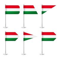Realistic various Hungarian table flags on a chrome steel pole. Souvenir from Hungary. Desk flag made of paper or fabric, shiny metal stand. Mockup for promotion and advertising. illustration vector