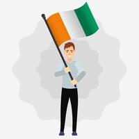 Happy Man Holding Ivory Coast Flag vector