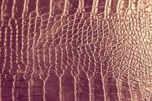 A close up of a leather surface with a pattern photo