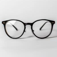 A pair of glasses with black frames and clear lenses photo
