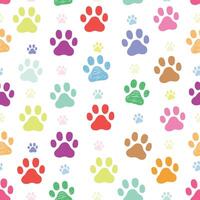 Colorful vibrant paw prints pattern vector