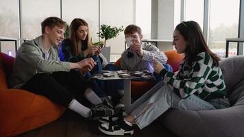 Students playing board games in modern lounge area video