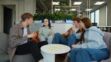 Students playing guessing game with sticky notes on forehead video