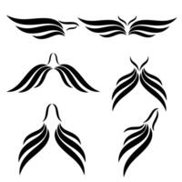 Set of black silhouettes of wings on a white background. vector