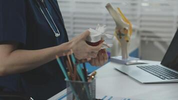 A woman in a blue uniform holding a piece of paper video