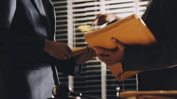 Two business people are holding a folder video