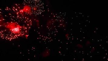 Colorful fireworks lighting up the night sky. Perfect for themes of celebration, holidays, and festive events video