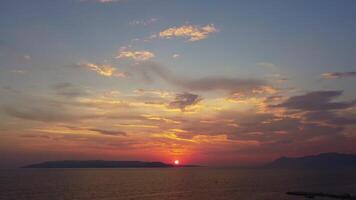Shot of Magnificent, relaxing view of the sunset over the sea from the Croatian coast. Aerial view of the setting sun and the endless Adriatic Sea video