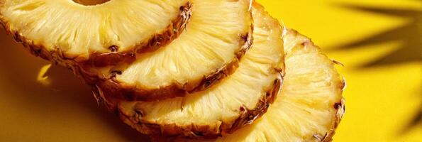 Sliced Pineapple Rings Stacked in a Spiraled Arrangement Casting Shadows on a Bright Background photo