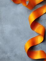 Floating Orange Zest Ribbon on a Soft Matte Background With Ample Blank Space Above for Creative Design photo