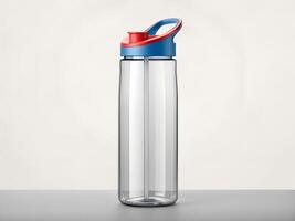 Clear Plastic Water Bottle with Blue and Red Lid and Handle photo