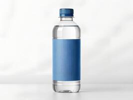 Clear Plastic Water Bottle with Blue Label and Cap on White Background photo