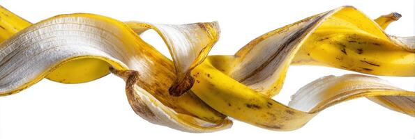 Abstract Composition Featuring a Banana Peel With a Clean White Background Highlighting Texture and Curves photo