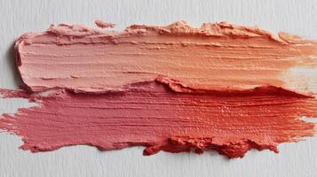 Neutral Tone Matte Clay Smear Texture With Pink and Orange Gradient Showcasing Artistic Application photo
