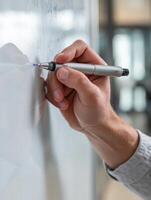 Teacher Writes Concepts on Whiteboard in Classroom During Lesson Engagement With Students Present photo
