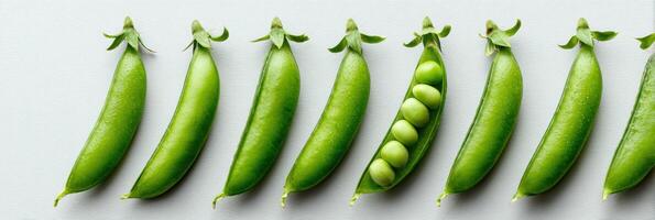 Bright Green Peas in Pod Arranged on a Clean Background With Minimal Layout Showcasing Their Freshness and Vibrant Color photo