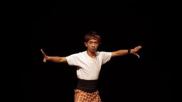 Young Dancer in Traditional Attire Performing on Stage video