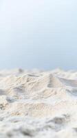 Close-up of Pristine Golden Sand Dunes Under a Clear Sky, Evoking Serenity and Natural Beauty of Coastal Landscapes and Deserts photo