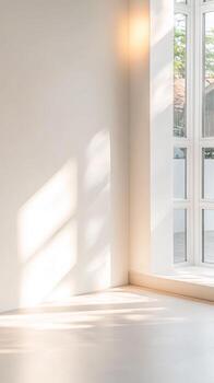 Minimalist Interior Design with Natural Sunlight and Shadows. Bright, Empty Room Corner with Large Window. Modern Architectural Space Background. photo