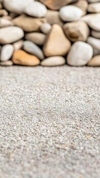 Natural Stone Wall and Gravel Ground Texture Serene Earthy Background with Smooth Pebbles and Fine Granular Surface for Organic Design Elements photo