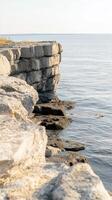 Majestic Sea Cliffs and Tranquil Ocean Waters A Rugged Coastal Landscape of Natural Stone Formations, Bathed in Gentle Sunlight photo