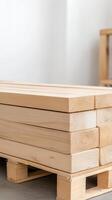 Stacked natural timber planks on a wooden pallet, ready for construction projects and DIY home improvement. Essential raw materials for carpentry and building. photo