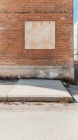 Timeless Urban Decay Weathered Brick Wall with Rustic Board and Concrete Sidewalk in Sunlight, Showcasing Gritty Architectural Textures. photo
