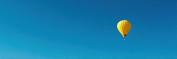 Surreal Hot Air Balloon Made of Banana Floating in a Clear Blue Sky With Ample Empty Space at the Top photo