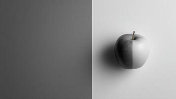 Grayscale Backdrop Featuring a Single Colored Apple Creating Minimalist Contrast in Modern Art Style photo