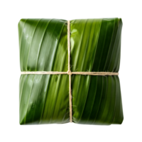A green banana leaf package is tied with rope and isolated on transparent background png