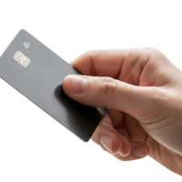 A hand holds a gray credit card with a contactless payment symbol, isolated on transparent background, ready for use in digital designs png