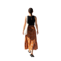 A woman in a patterned skirt walks away, her braid swaying gently as she carries a tote bag on a sunny day isolated on transparent background png