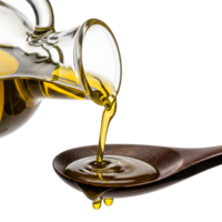 Olive oil is being poured from a glass bottle into a wooden spoon isolated on transparent background png