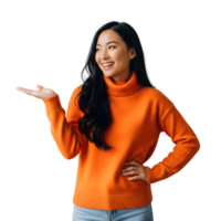Smiling asian woman in orange sweater presenting something isolated on transparent background png