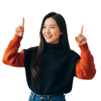 Smiling asian woman in sweater pointing upwards isolated on transparent background png