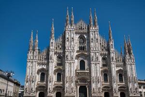 Milan Cathedral, officially the Metropolitan Cathedral of the Nativity of the Blessed Virgin Mary, is the cathedral of the Archdiocese of Milan and an Italian national monument. photo