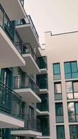 Exterior of a modern high-rise building. Modern multi-storey residential building with windows and large balconies video