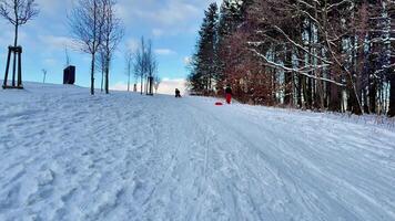 A stunning snowy hill perfect for sledding and various fun winter activities, offering endless enjoyment photo